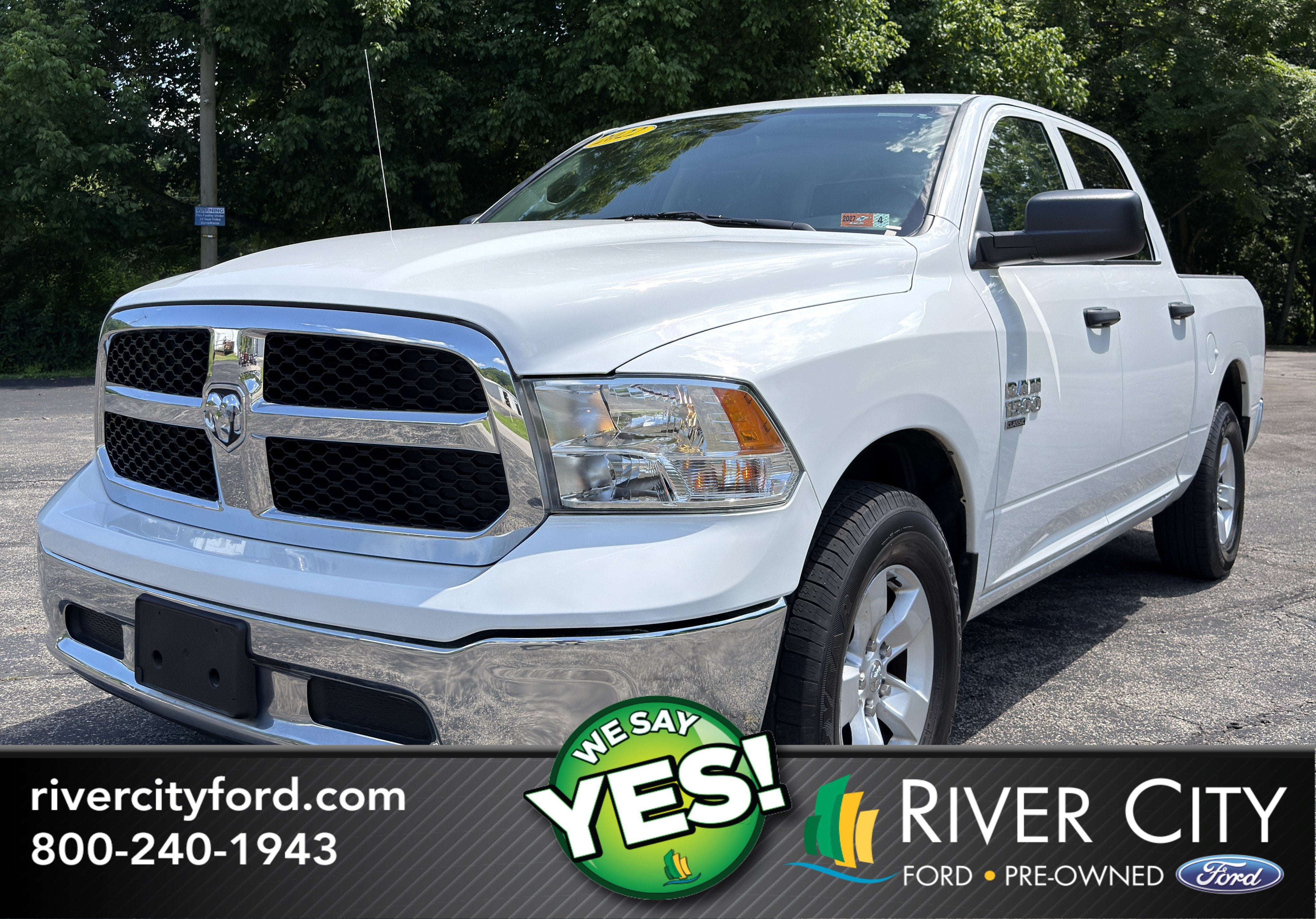 2022 RAM 1500 Classic SLT in Bright White Clearcoat — front three-quarter view