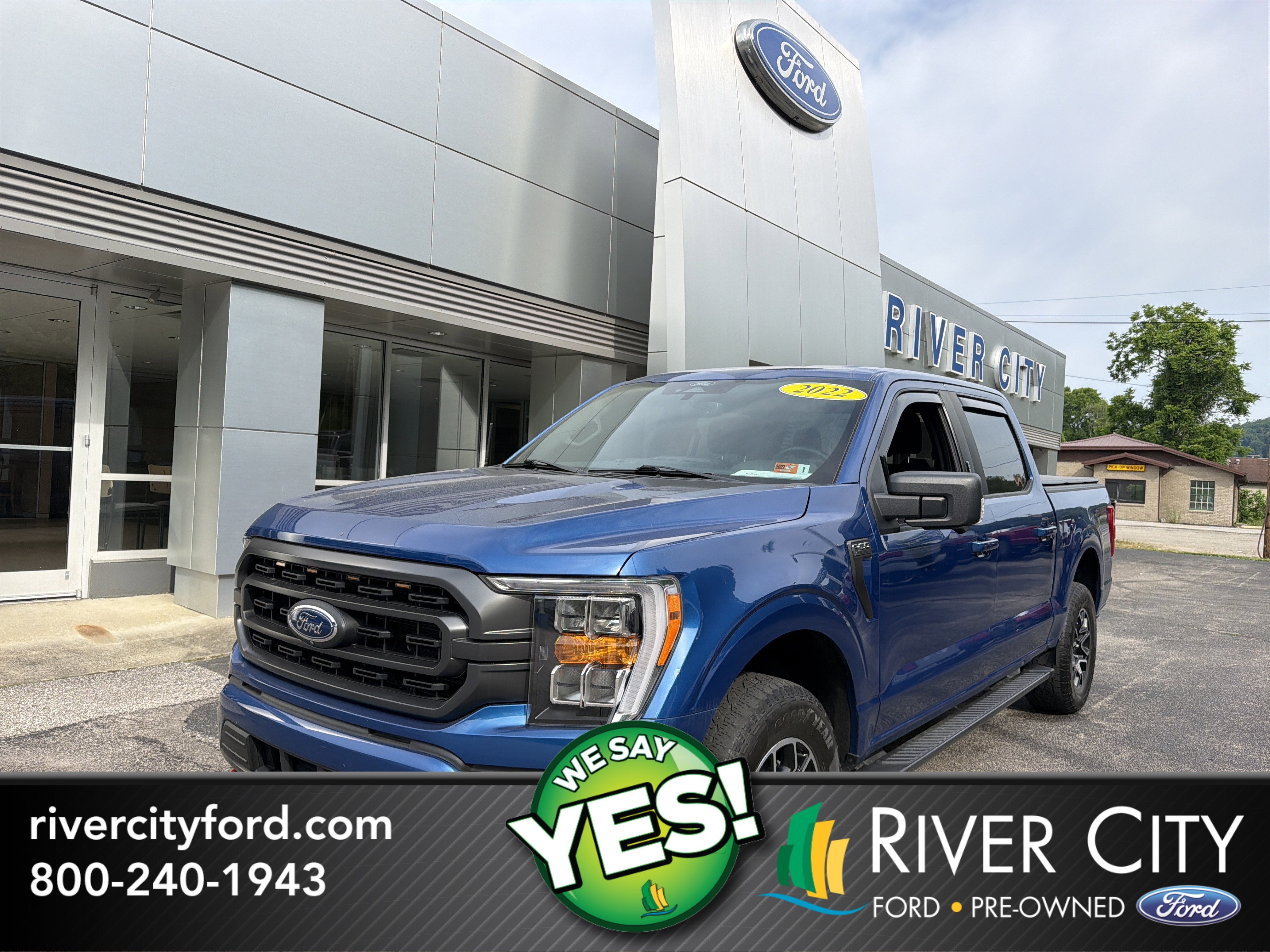 2022 Ford F-150 XLT in Atlas Blue Metallic — front three-quarter view