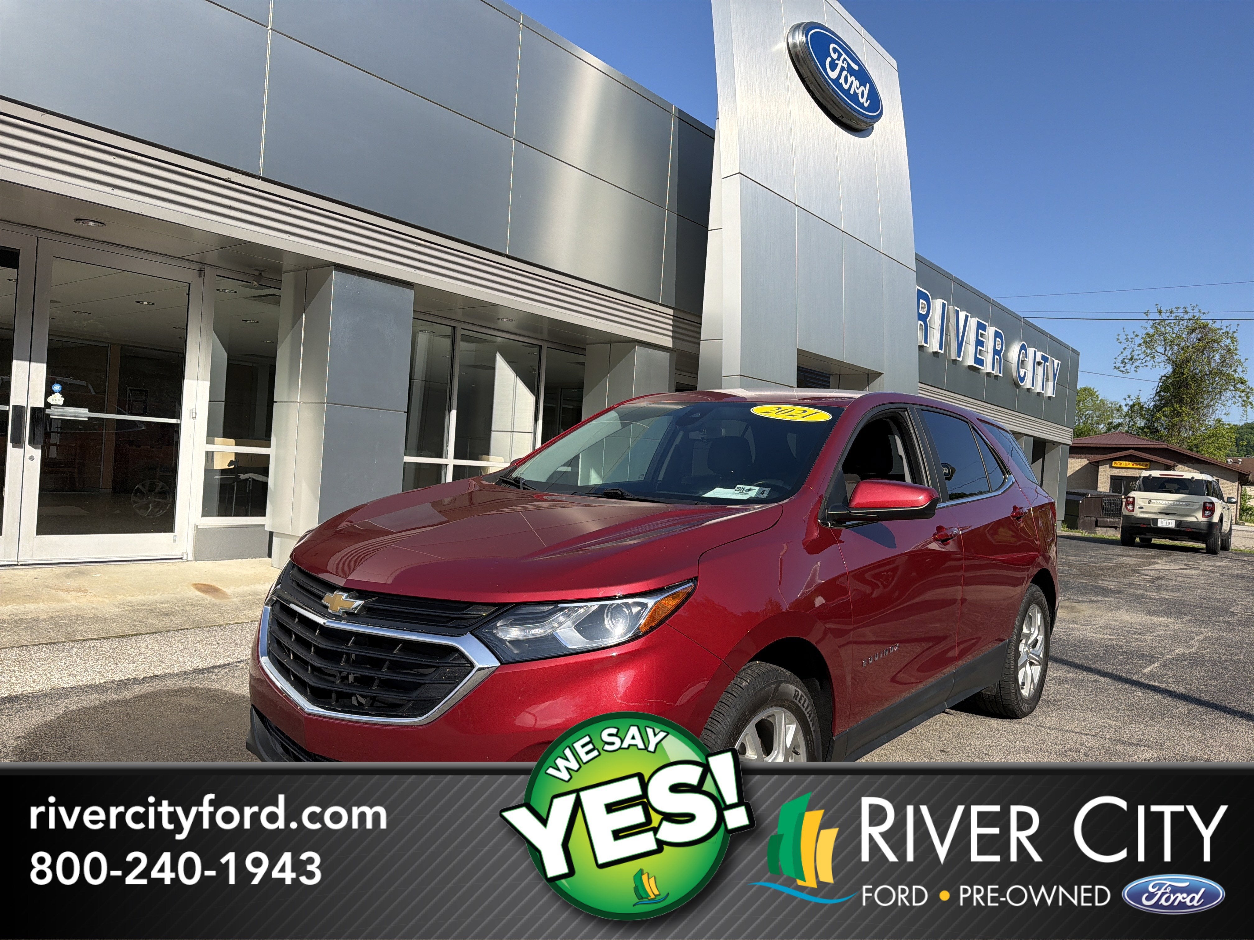 2021 Chevrolet Equinox LT in Cajun Red Tintcoat — front three-quarter view