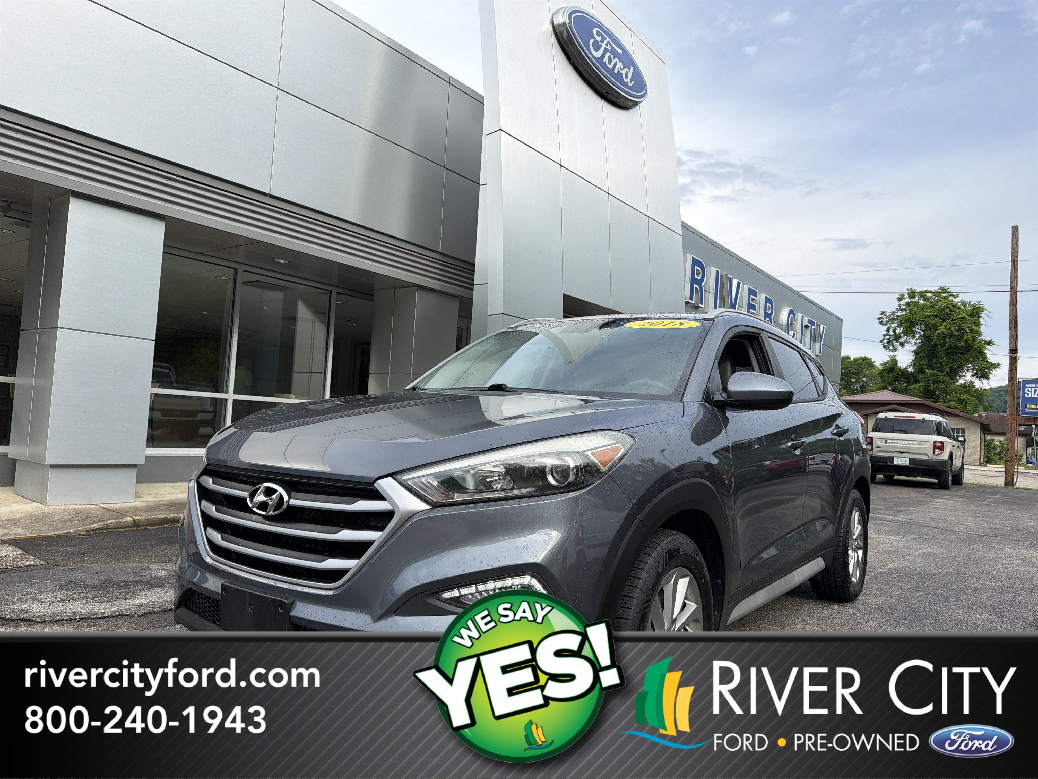 2018 Hyundai Tucson SEL in Coliseum Gray — front three-quarter view